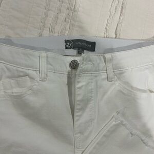 White ankle jeans with scallop hem